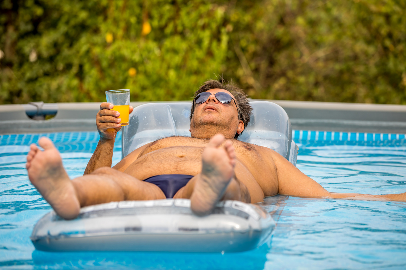 Funny fat guy in the pool.